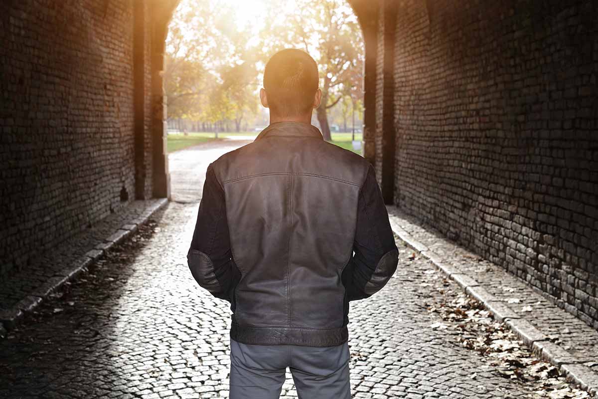 man looking forward to light at the end of a tunnel, how to stay sober