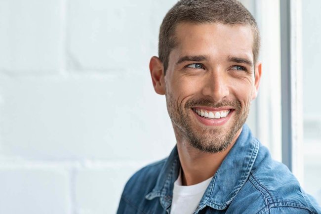 smiling man in a denim jacket, cure for alcoholism