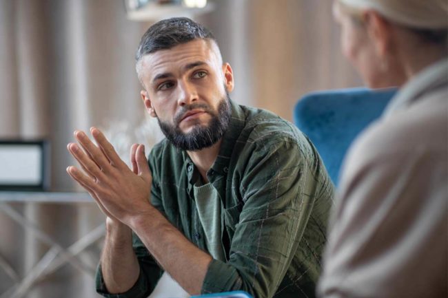 man learning about Substance Abuse Treatment outside of Dallas TX