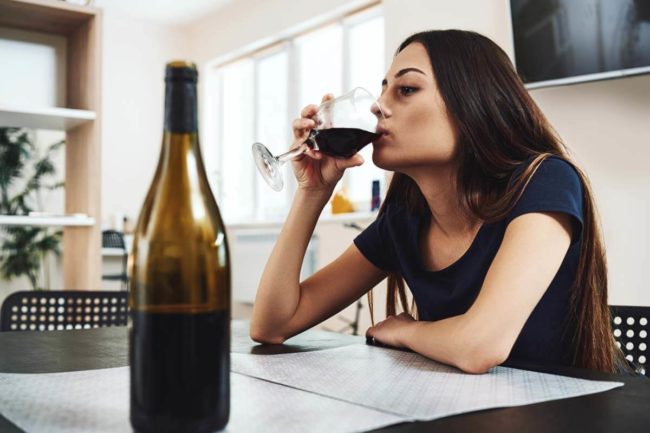 woman drinking wine not worried about San Antonio Drinking Problems
