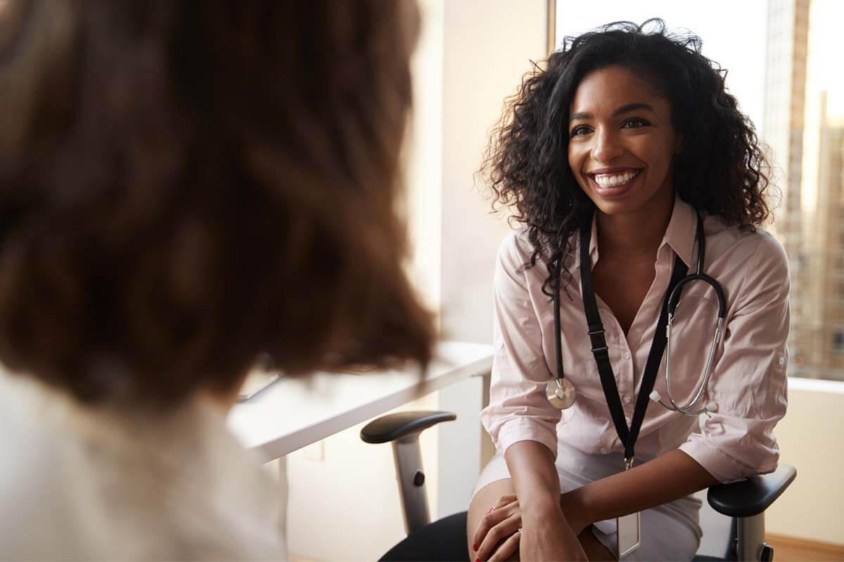 doctor meeting with woman at a heroin clinic in San Antonio