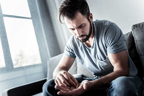 man suffering from physical dependence
