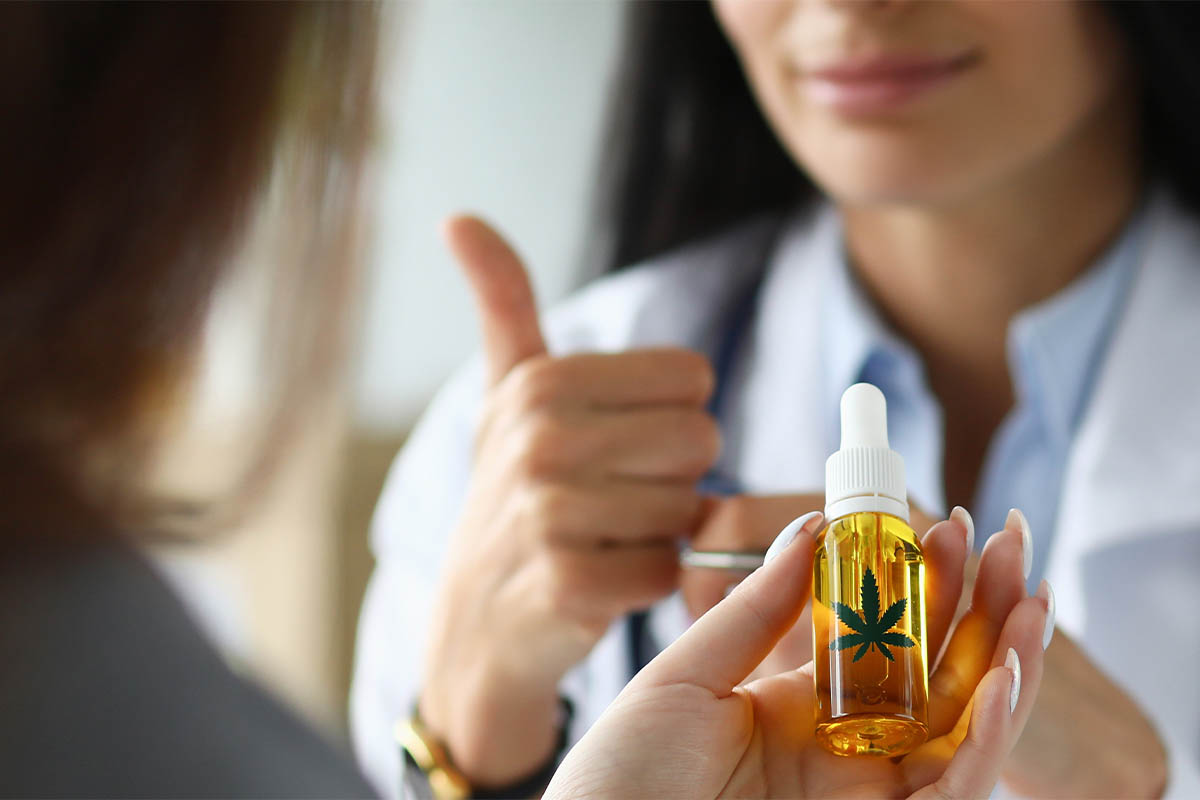 woman explains the difference between CBD an THC