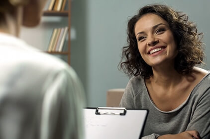 woman talking with her therapist in an individual therapy program