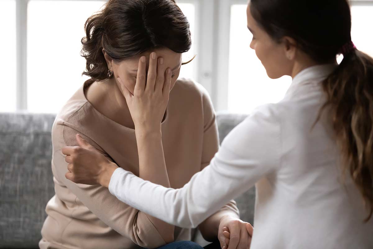 woman deals with the link between trauma and addiction