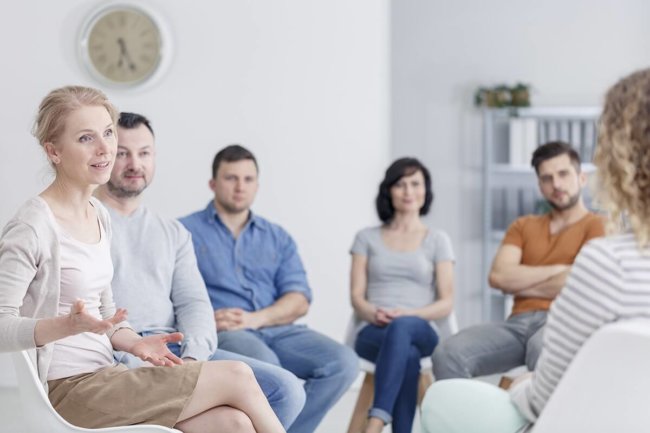 a new group of individuals learning what is Alcoholics Anonymous