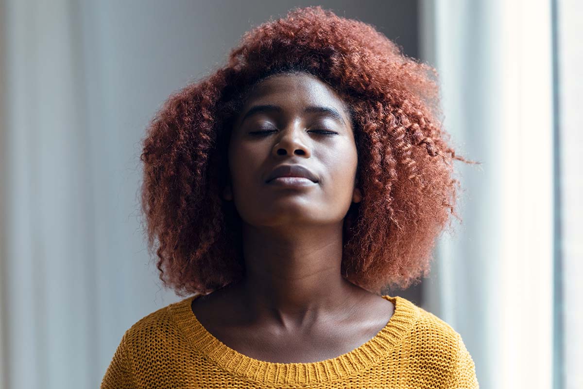 Woman wondering how to control anxiety