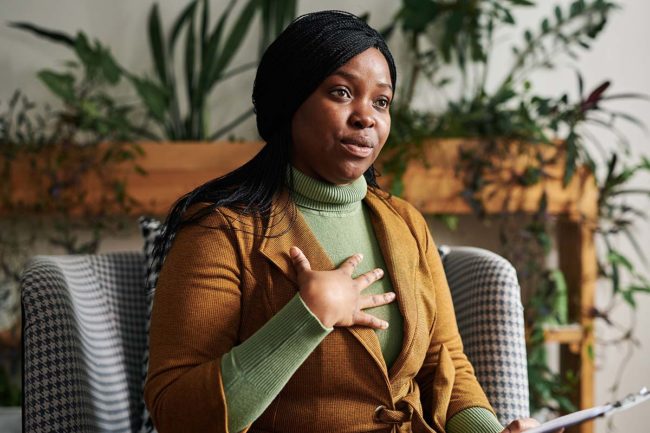 A woman curious about the distinction of therapist vs. psychologist