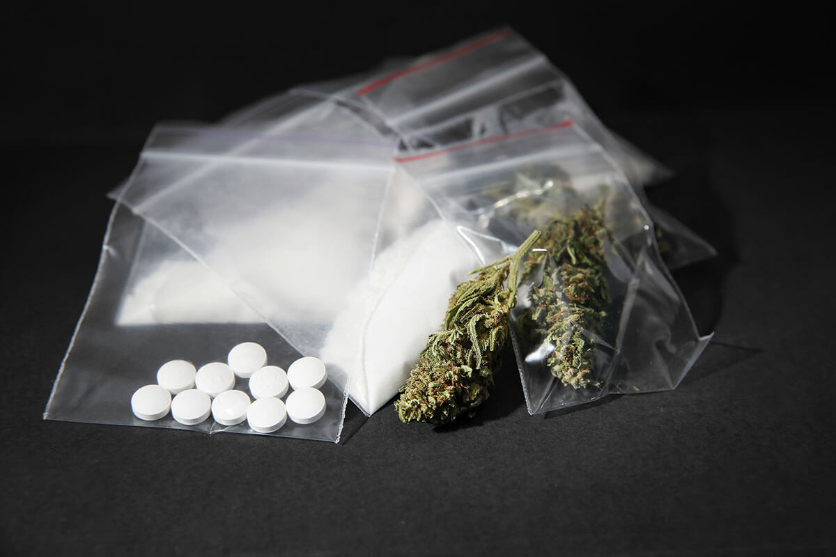 baggies of weed pills and cocaine used for drug abuse