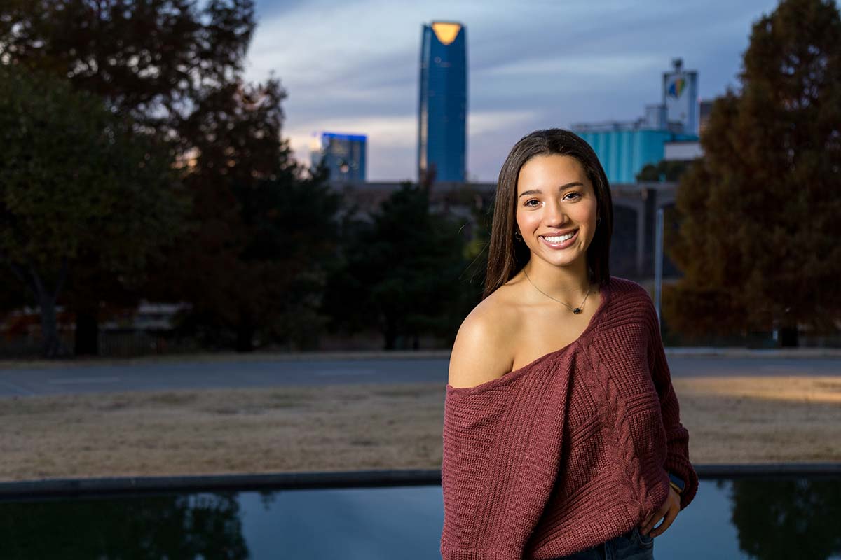 A woman smiles as she considers drug rehab programs in Oklahoma City, OK