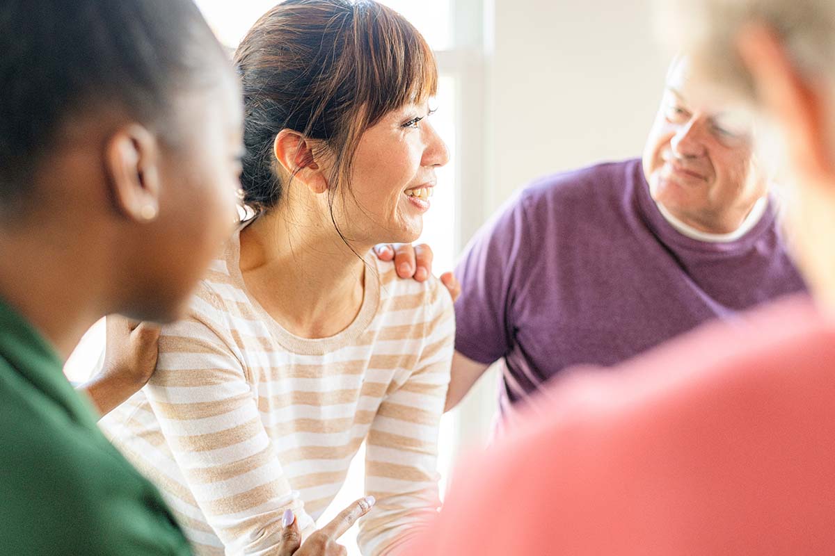 people in a group therapy program