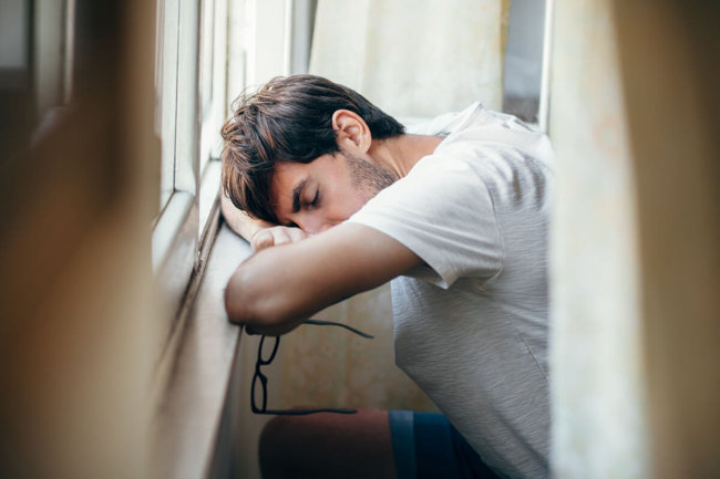 man passed out at windowsill part of substance abuse statistics