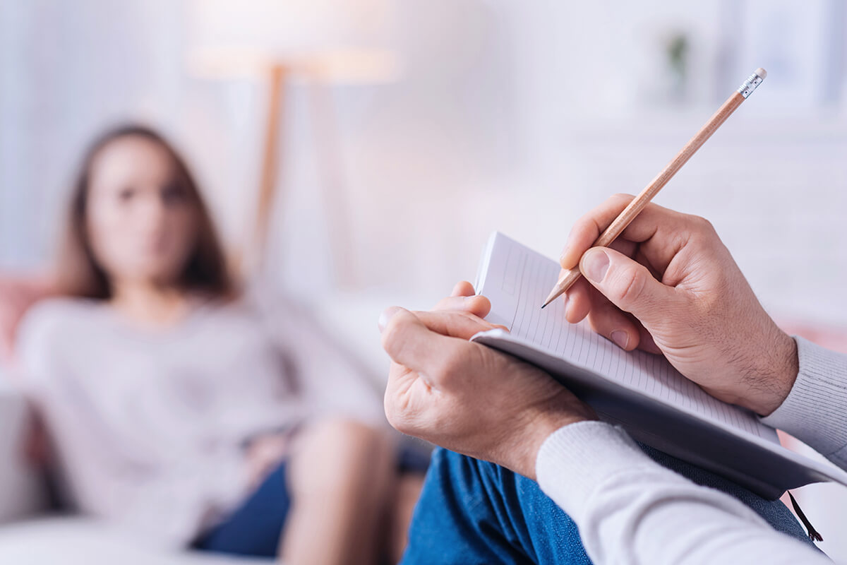 man taking notes while asking Do I Need THC Addiction Treatment