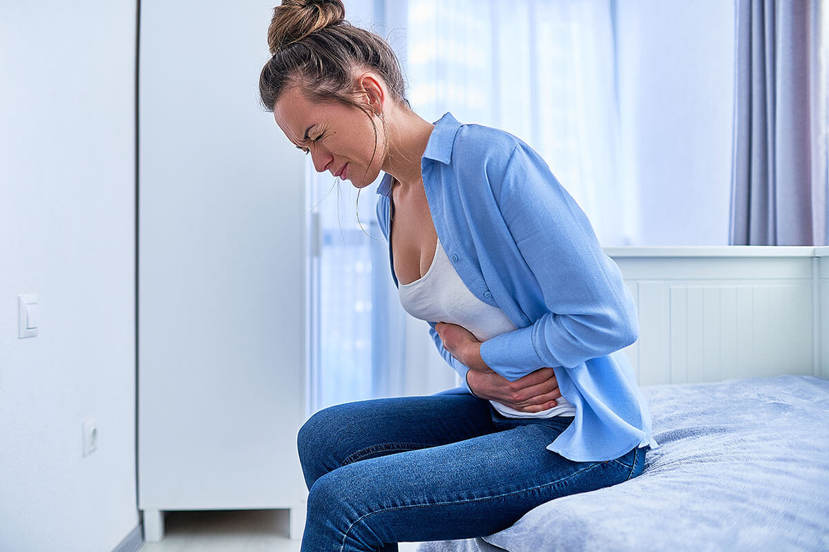 woman wincing due to methadone effects on the body