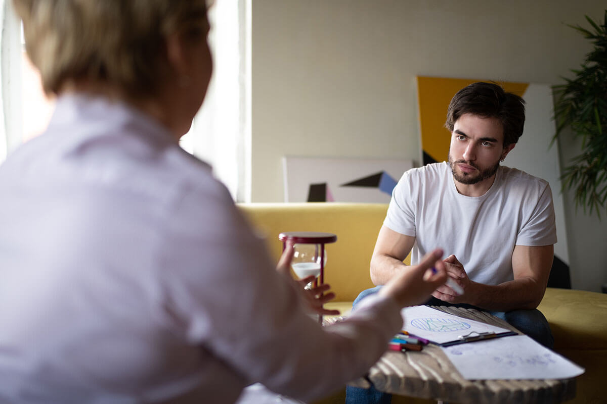 man asking doctor about inpatient vs outpatient detox