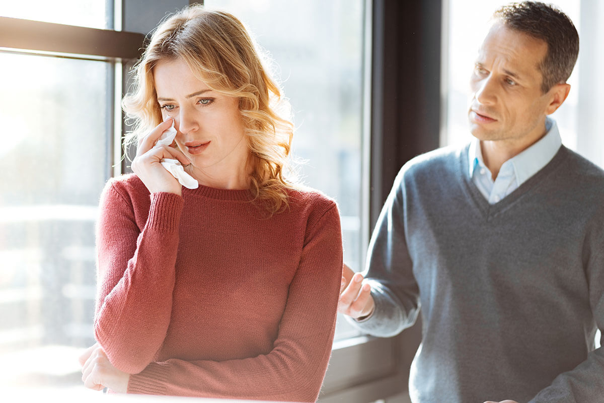 husband comforting wife wondering is my loved one struggling with depression