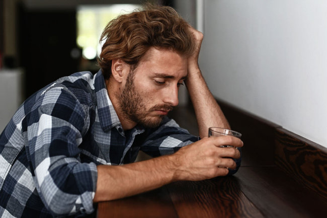 drunk man wonders what is an alcoholic