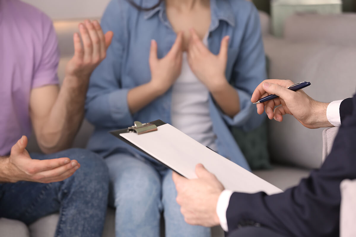a substance abuse professional meets with a group of people