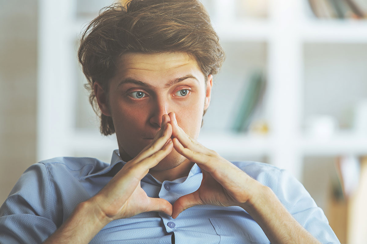 Man thinking about caffeine addiction and drug addiction
