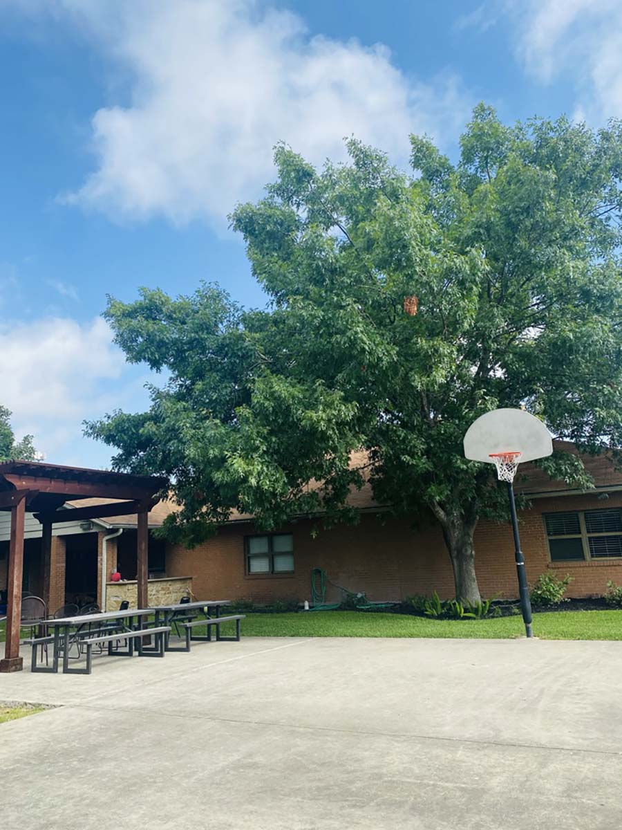 Outside view of building with basketball hoop