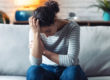 A woman feeling the effects of alcohol on the body