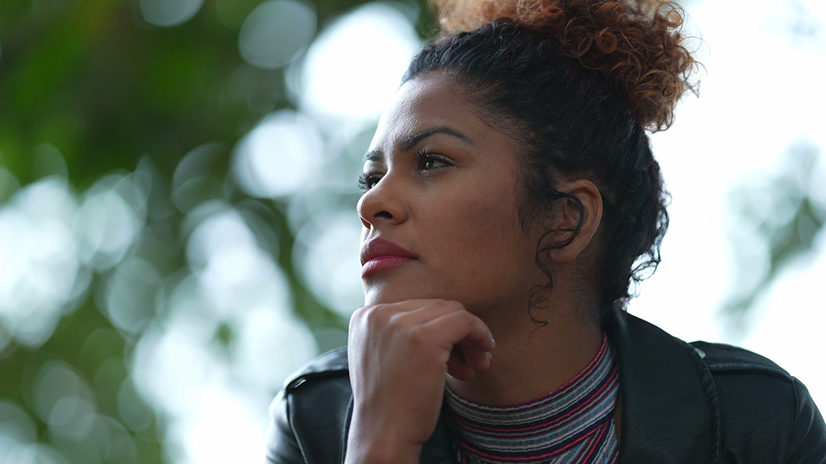 Woman contemplating residential drug treatment