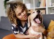 Woman enjoying the benefits of animal assisted therapy