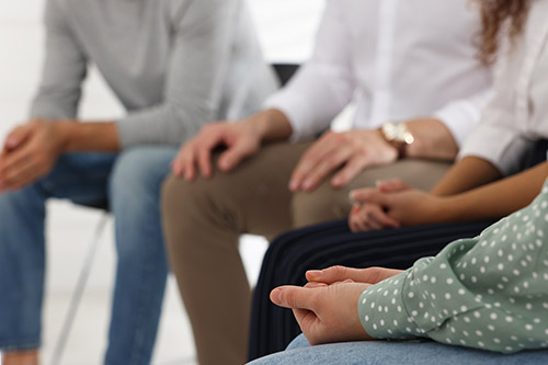 A group of people in an alcoholics anonymous program