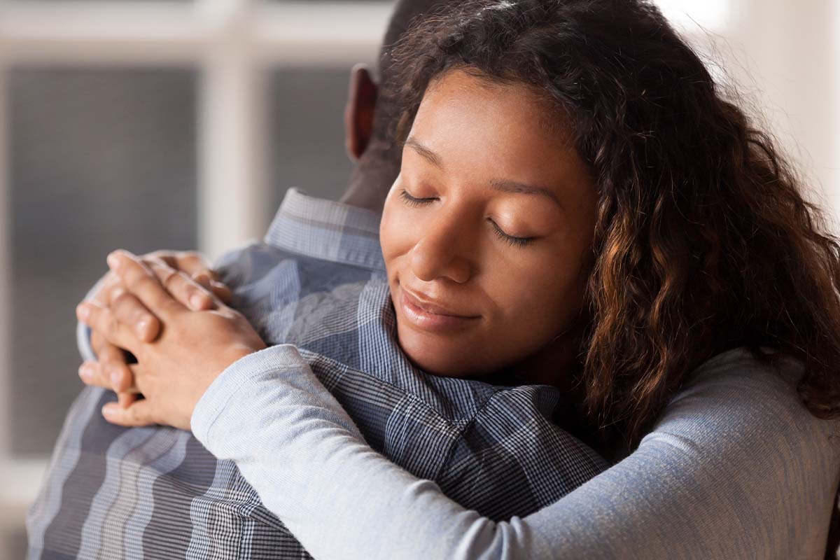 Two people enjoying the benefits of family therapy