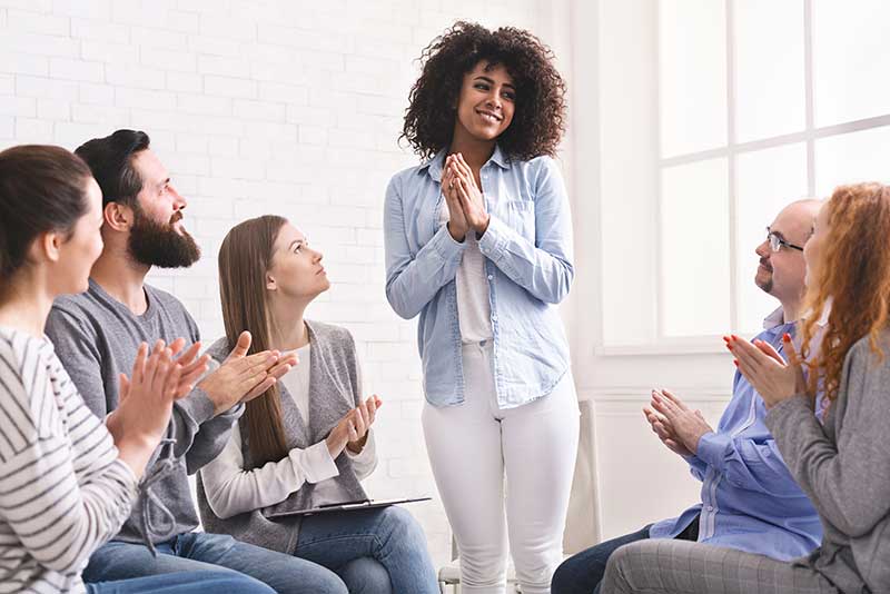 Several people in group therapy for addiction