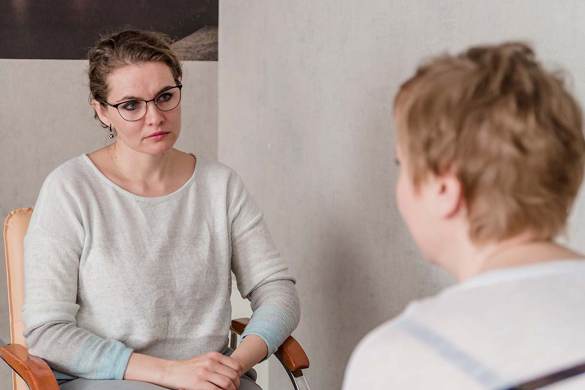 Two women exploring the question, "What is dialectical behavior therapy?"