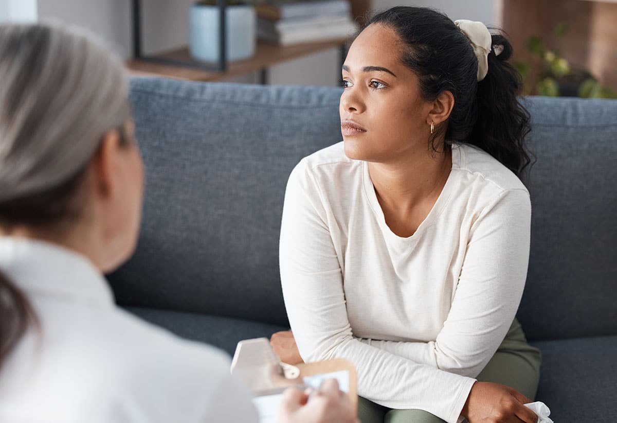 Woman learning about coping skills for relapse prevention