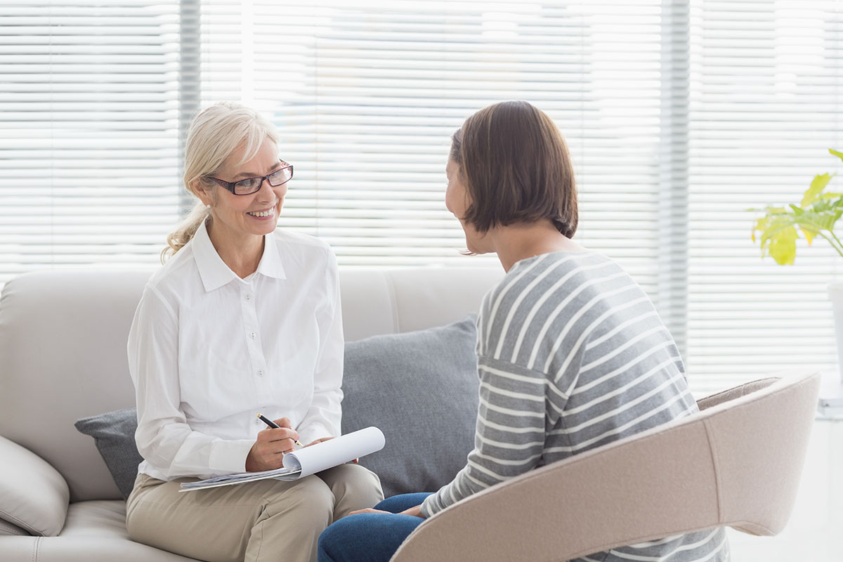 A woman being taught coping skills for relapse prevention